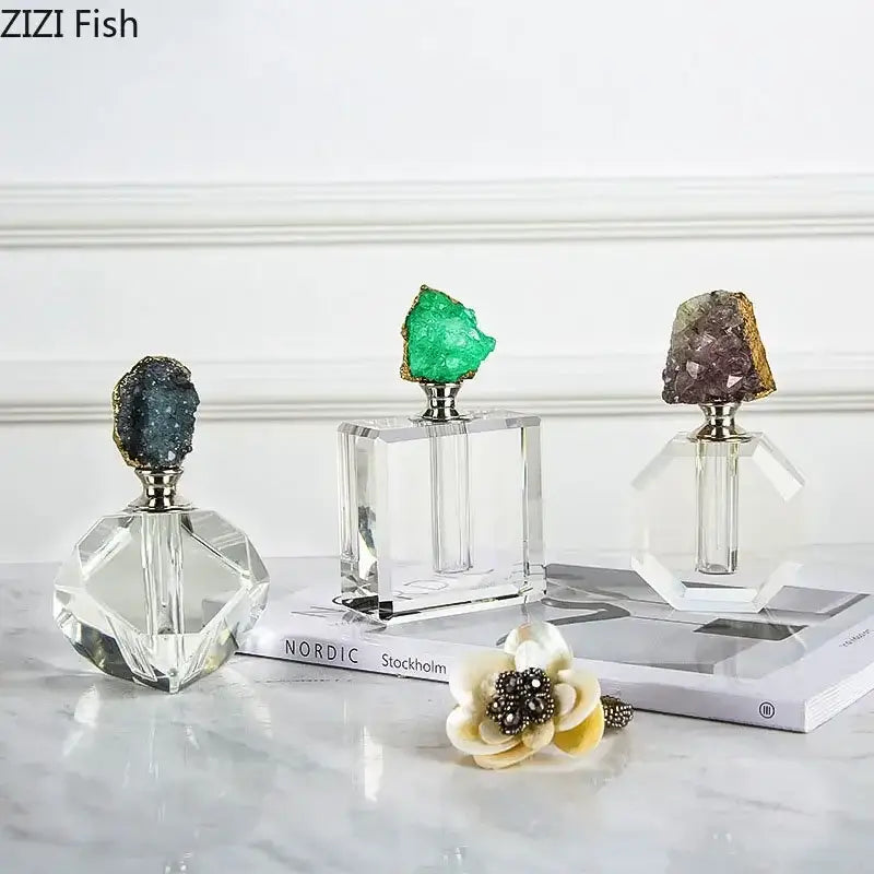 Three agate stone perfume bottles in green purple and dark blue with geode caps for essential oils and crystal decor