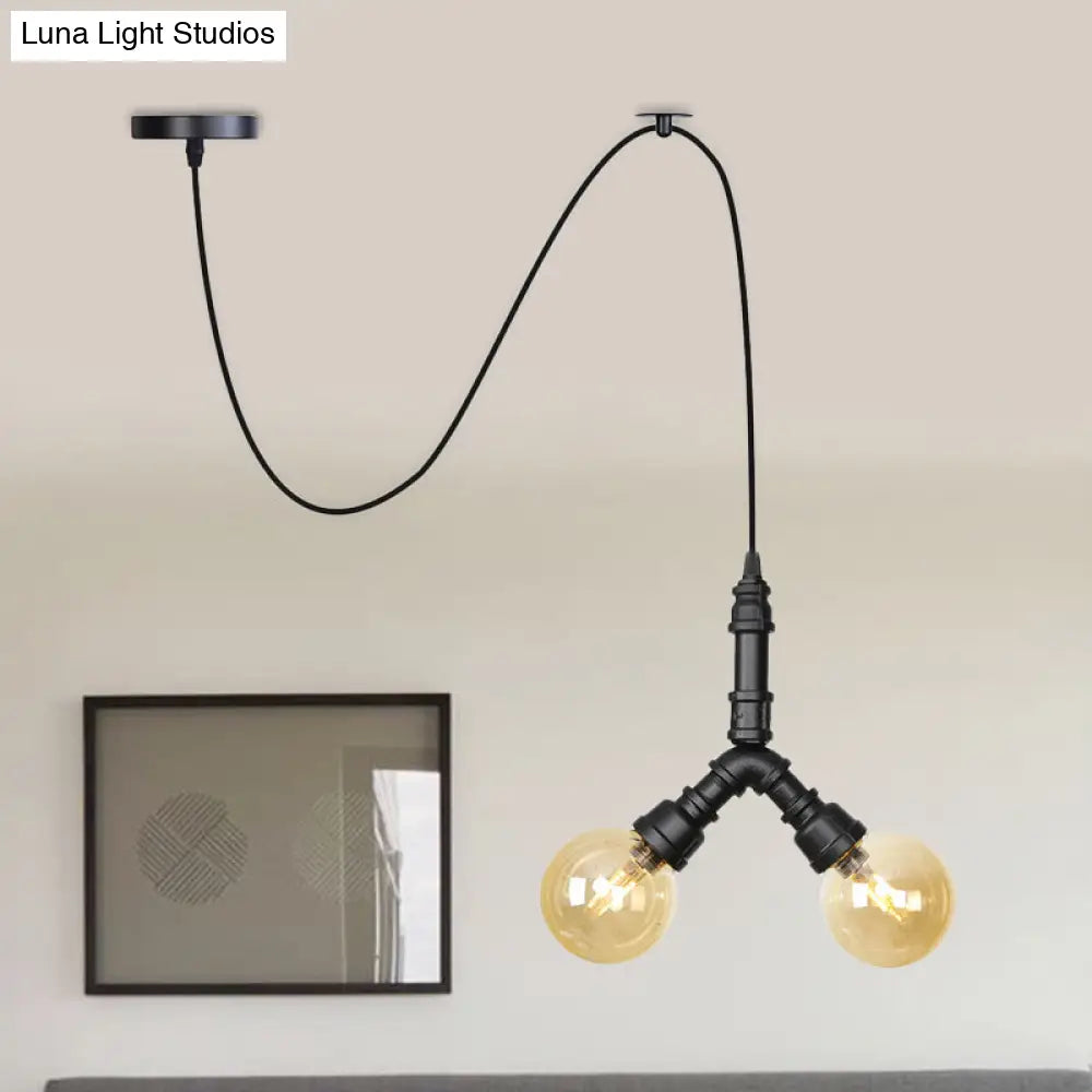 Alamak - Modern Amber Glass Pendant Chandelier with Swag Design