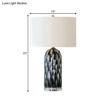 Algieba - Lámpara de mesa retro de una cabeza con pantalla recta y base cilíndrica, de tela blanca.