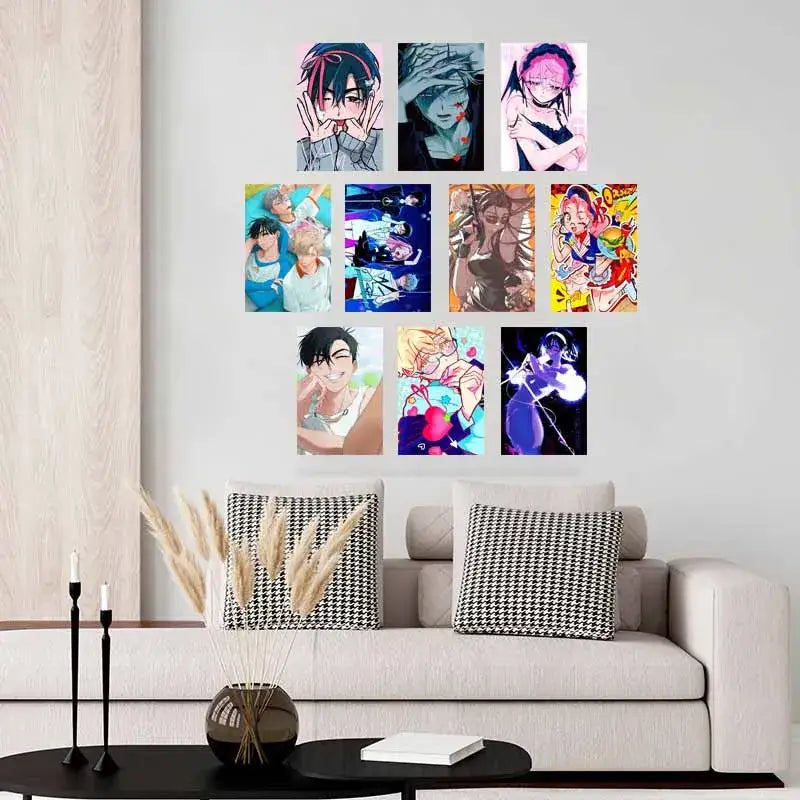 Nine framed beige wall anime photo cards above sofa with houndstooth cushions from decorbites™ alien anime photo cards set