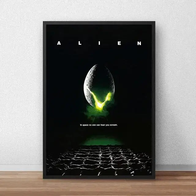Black-framed decorbites™ alien movie poster canvas painting featuring a glowing green egg on dark background