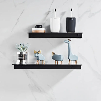 Set of three light blue ceramic animal figurines with wooden legs displayed on aluminum floating shelves for bathroom and kitchen