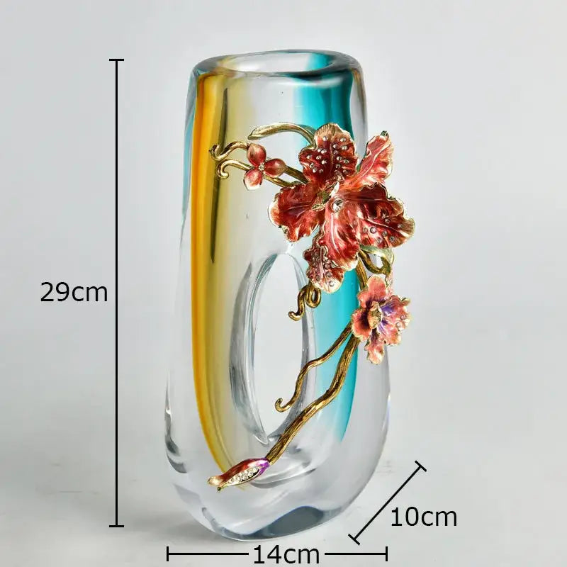 A tall slender amber and blue gradient glass vase with red enamel floral relief on gold vine for living room decor
