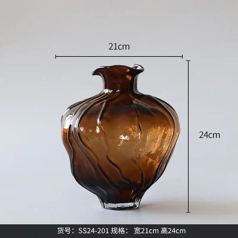 A translucent amber brown wavy grain glass pumpkin vase with a fluted shape for living room decorbites brown wavy decor