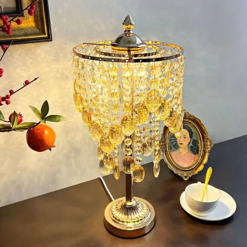 Amber and clear decorbites crystal glass table lamp with golden crystal chandelier style and metallic base for bedroom decor