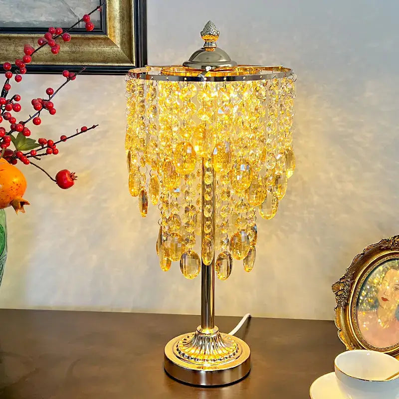 Amber and clear decorbites crystal glass table lamp with golden chandelier crystals and polished chrome base for living room decor
