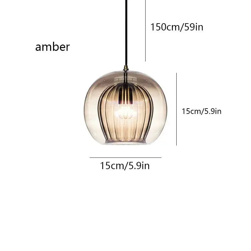 Amber-colored glass pendant light with vertical ribbed texture and black cord for kitchen gold globe cord pendant
