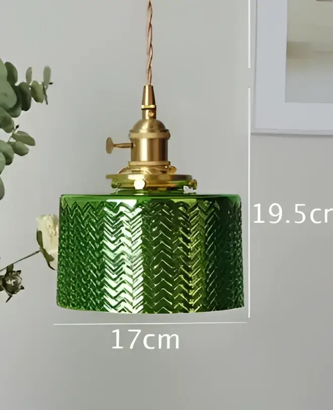Green glass pendant light with textured chevron pattern and brass hardware ideal as dining room glass pendant light