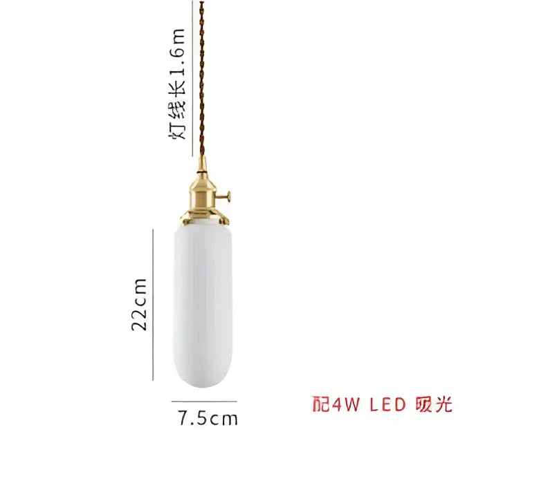 Amber and cream geometric glass pendant light with sleek white ceramic and gold fixture for modern dining room interiors
