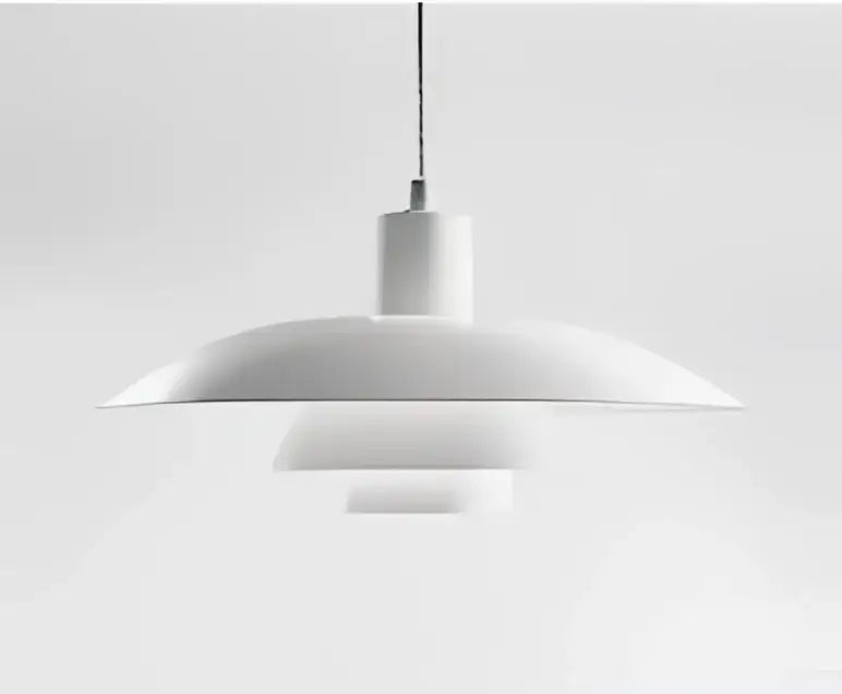 White minimalist pendant light with concentric circular shades in amber and cream geometric glass for dining room
