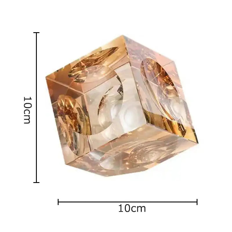 Amber crystal cube statue desk ornament in translucent amber with golden circular inlays for decorbites crystal cube decor