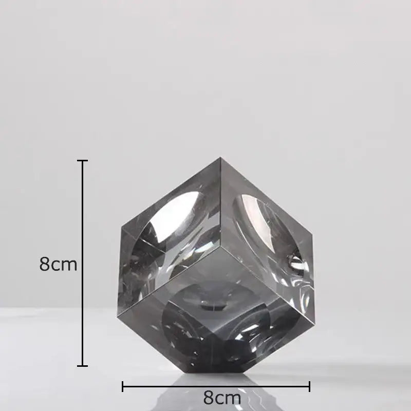 Amber crystal cube statue desk ornament featuring a sleek dark gray translucent crystal cube with polished reflective facets decorbites crystal cube
