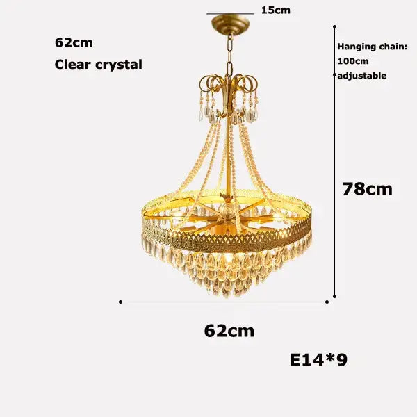 Gold-toned amber crystal water drop chandelier with clear crystal water droplets and ornate frame for dining room decorbites