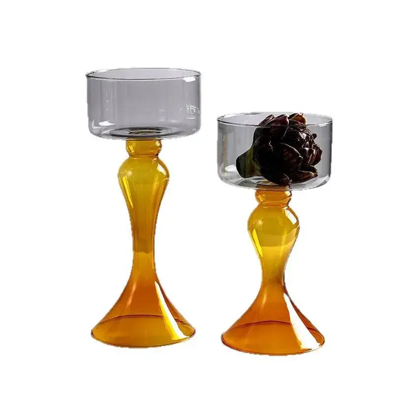 Two amber glass candle holders with flared bases and translucent gray bowls by decorbites geometric glass vase design