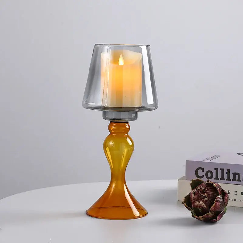 A translucent amber glass candle holder with a fluted tapered top and bulbous base from decorbites geometric glass vase collection