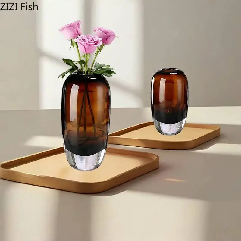 Brown gradient decorbites delicate glass vase with clear base holding pink roses for living room floral decor
