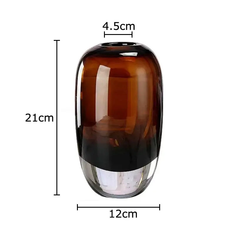 A decorbites delicate glass amber vase 21cm tall with a gradient brown to clear base for living room decor