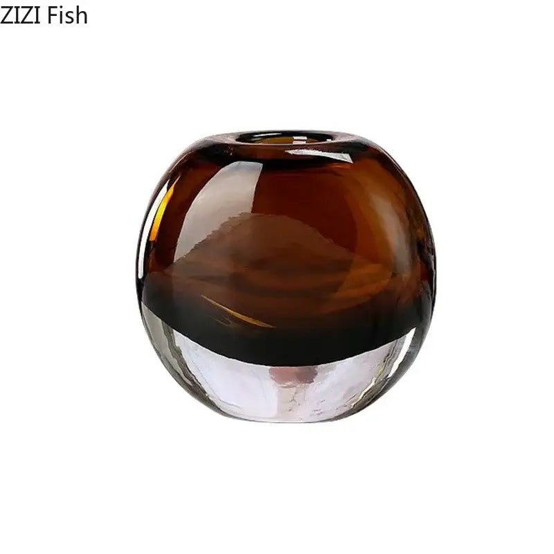 A sleek rounded decorbites delicate glass vase with amber to clear gradient for living room floral decor