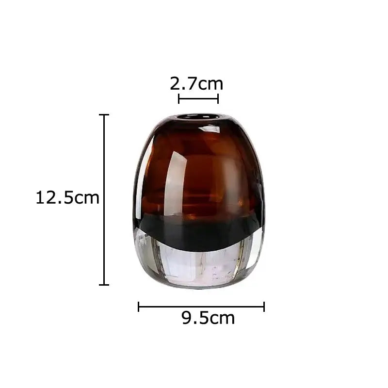 A decorbites delicate glass vase with amber to clear gradient and black band for living room floral decor