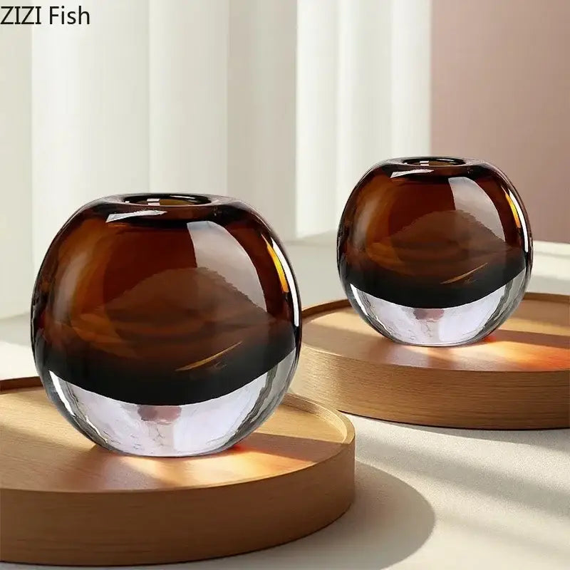 Two amber delicate glass vases with gradient effect and smooth rounded shapes for living room floral decorbites decor