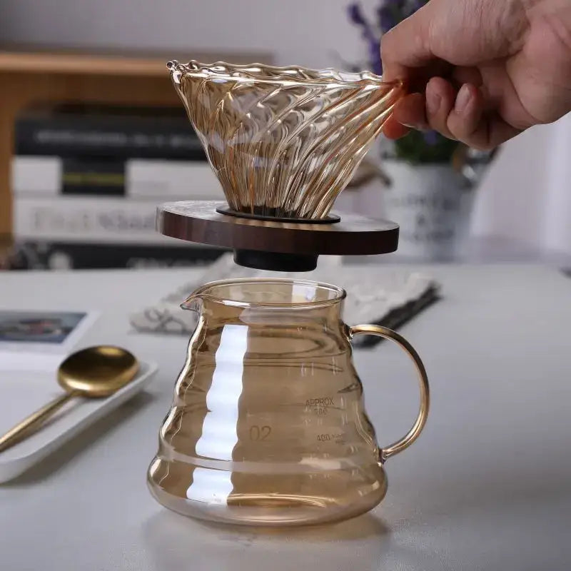 Amber fluted glass percolator coffee pot with wooden base and reusable filter for kitchen brewing