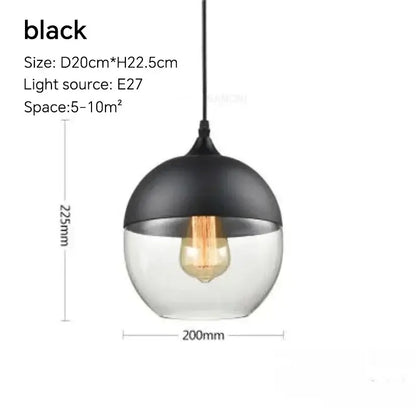 Black dome pendant light fixture with clear glass lower half and exposed Edison bulb for dining room use