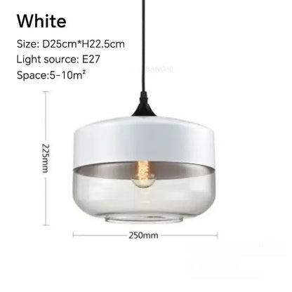 White pendant light fixture with clear glass base, frosted upper section, and exposed edison bulb for dining room