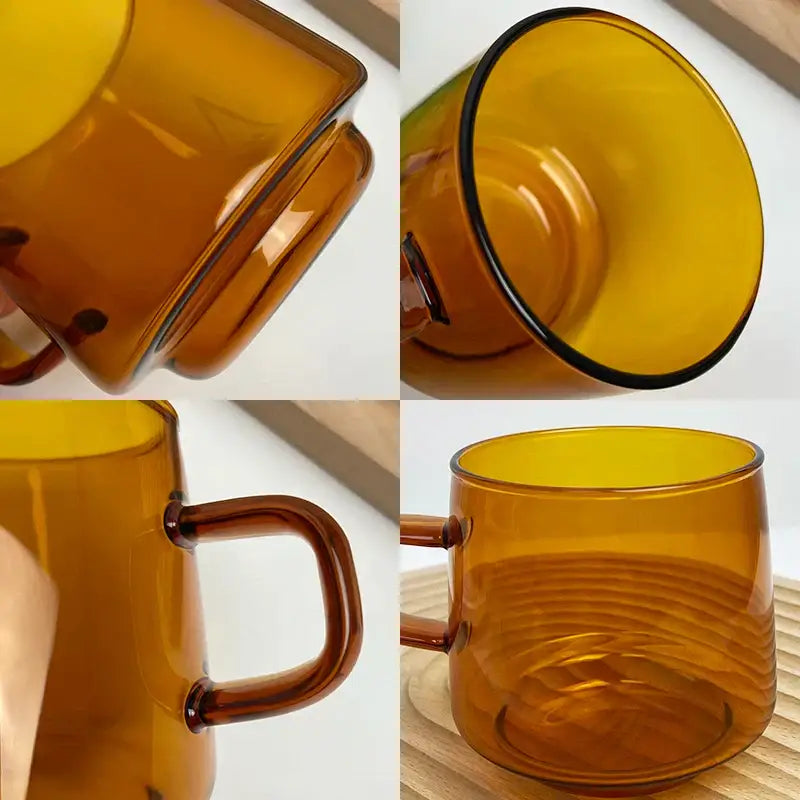 A translucent amber glass coffee mug with smooth rounded handle and subtle ridges from decorbites glass coffee collection
