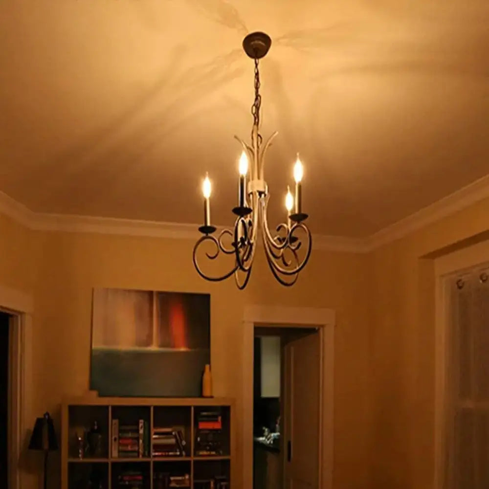 Antique-style wrought iron chandelier with five lit amber dimmable led filament bulbs for dining room decorbites dimmable led