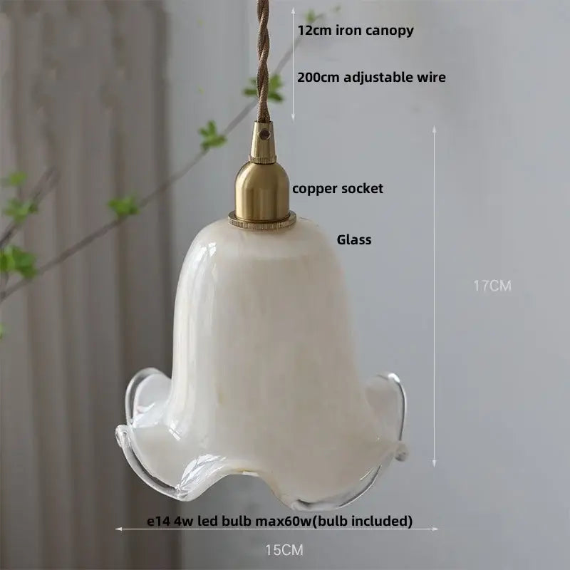 A delicate off-white glass led pendant lamp with copper socket and iron canopy for kitchen lighting
