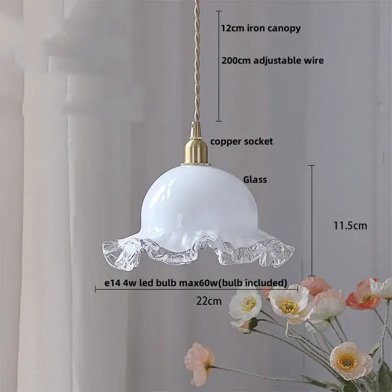 White glass led pendant lamp with ruffled translucent crystal edge and brass accents for kitchen lighting