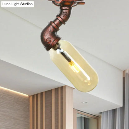 وحدة إضاءة بيضاوية شبه مستوية من ديكوربايتس™ مصنوعة من زجاج العنبر والنحاس المتآكل بتصميم أنابيب صناعية لغرفة المعيشة