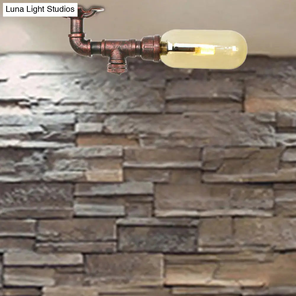 وحدة إضاءة بيضاوية شبه مستوية من ديكوربايتس™ مصنوعة من زجاج العنبر والنحاس المتآكل بتصميم أنابيب صناعية لغرفة المعيشة