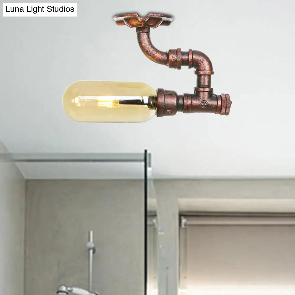 وحدة إضاءة بيضاوية شبه مستوية من ديكوربايتس™ مصنوعة من زجاج العنبر والنحاس المتآكل بتصميم أنابيب صناعية لغرفة المعيشة