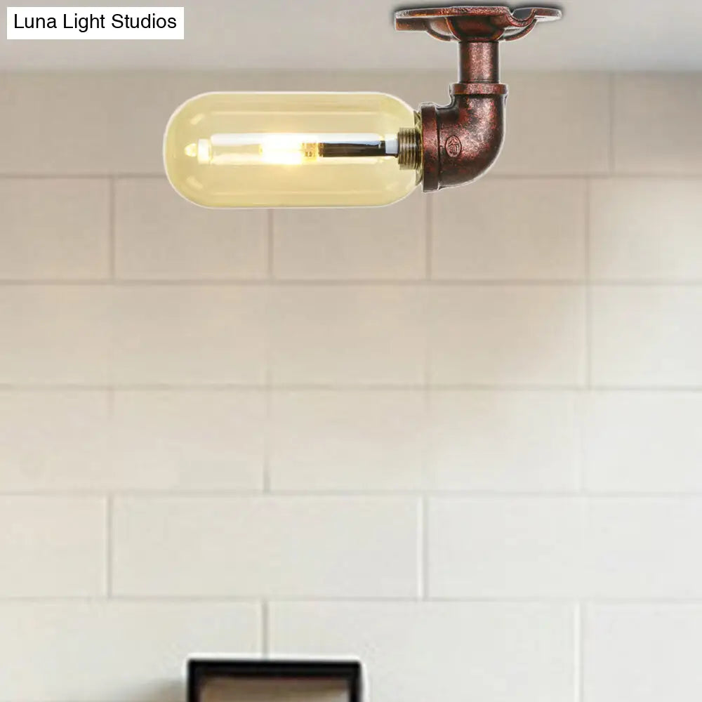 وحدة إضاءة بيضاوية شبه مستوية من ديكوربايتس™ مصنوعة من زجاج العنبر والنحاس المتآكل بتصميم أنابيب صناعية لغرفة المعيشة