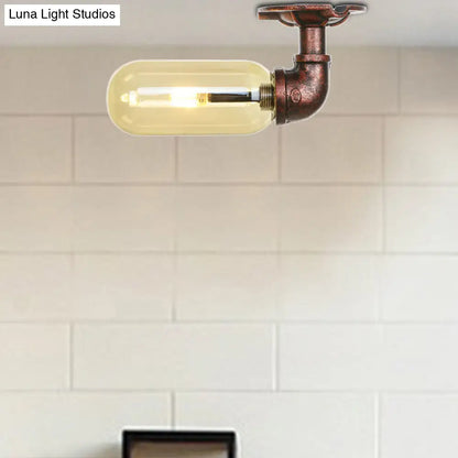 وحدة إضاءة بيضاوية شبه مستوية من ديكوربايتس™ مصنوعة من زجاج العنبر والنحاس المتآكل بتصميم أنابيب صناعية لغرفة المعيشة