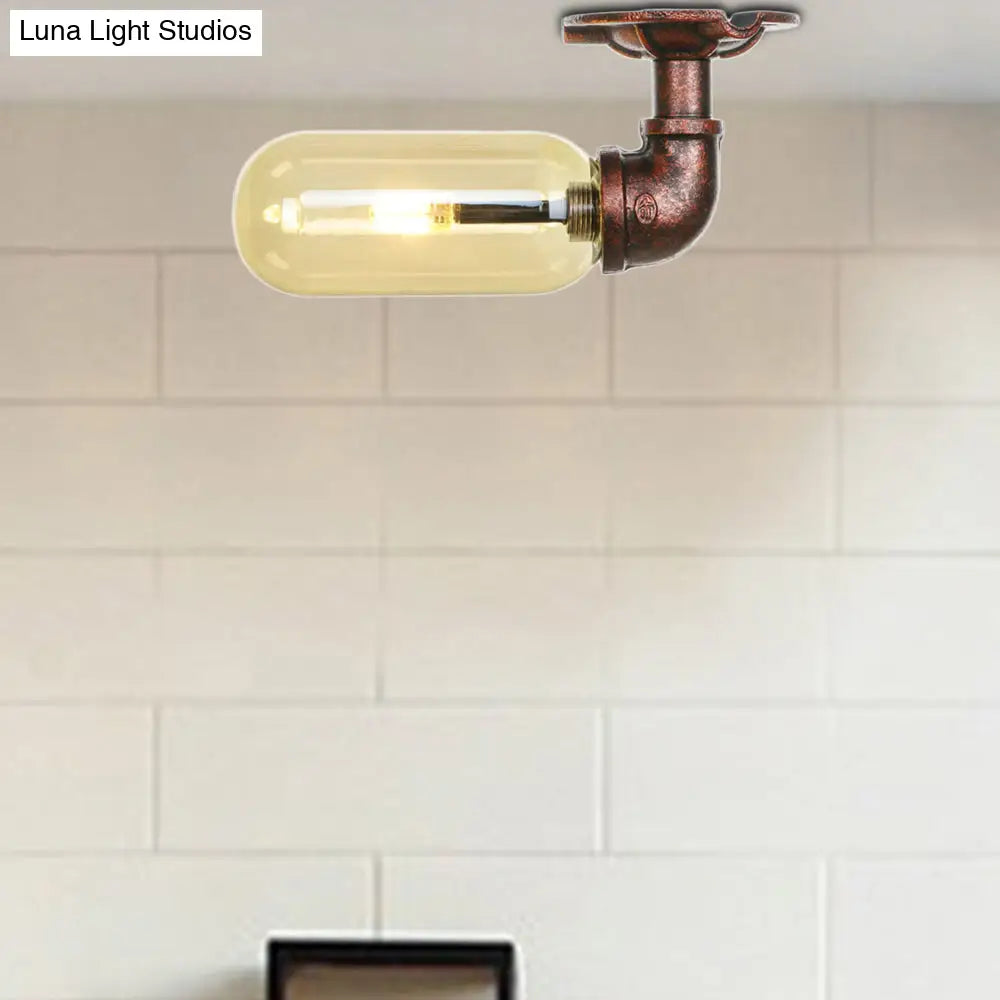 وحدة إضاءة بيضاوية شبه مستوية من ديكوربايتس™ مصنوعة من زجاج العنبر والنحاس المتآكل بتصميم أنابيب صناعية لغرفة المعيشة