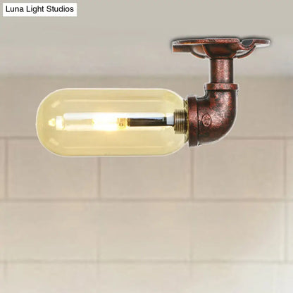 وحدة إضاءة بيضاوية شبه مستوية من ديكوربايتس™ مصنوعة من زجاج العنبر والنحاس المتآكل بتصميم أنابيب صناعية لغرفة المعيشة