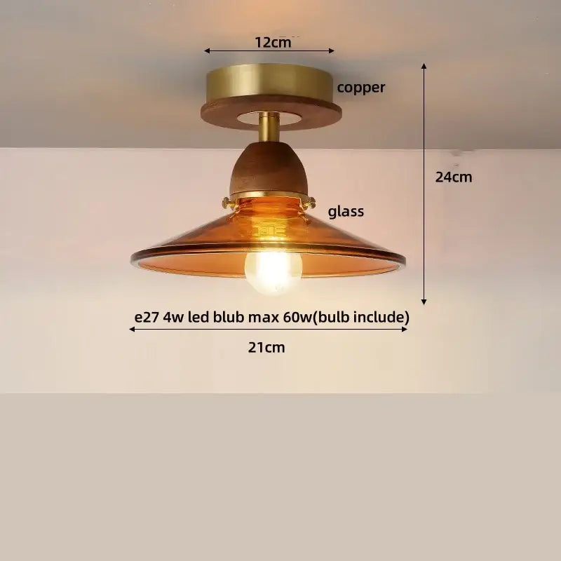 Copper-finished ceiling light with amber glass shade and warm glowing wood copper led for dining room ceiling light