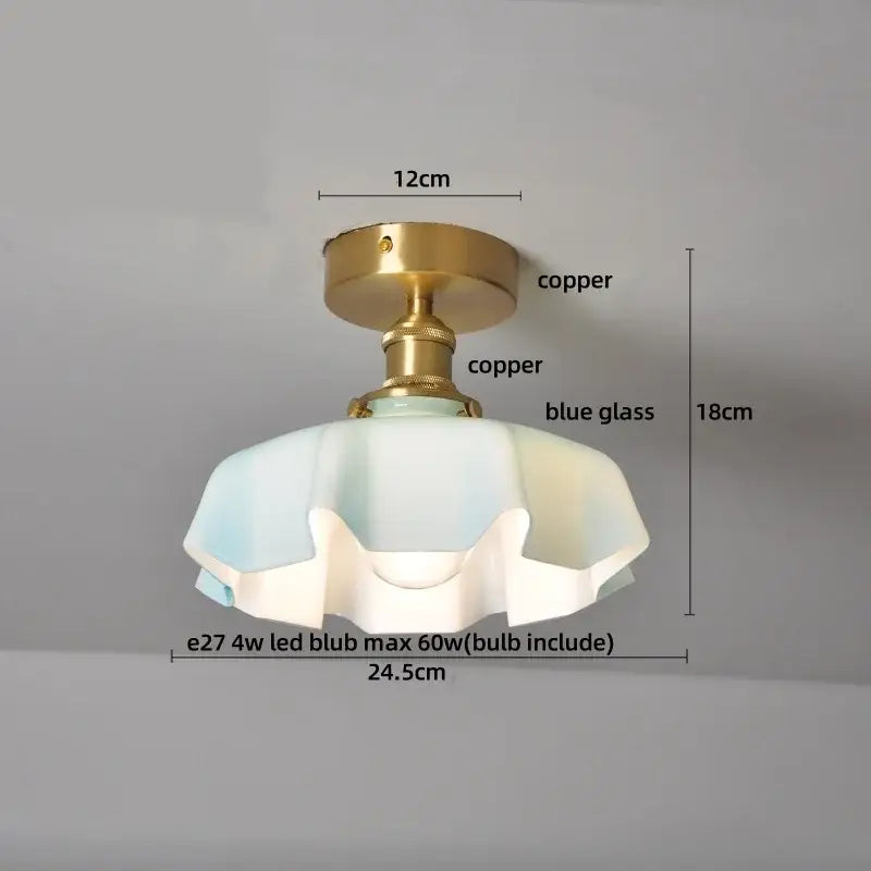 Vintage-style ceiling light with copper led ceiling base and ruffled blue glass shade for dining room lighting