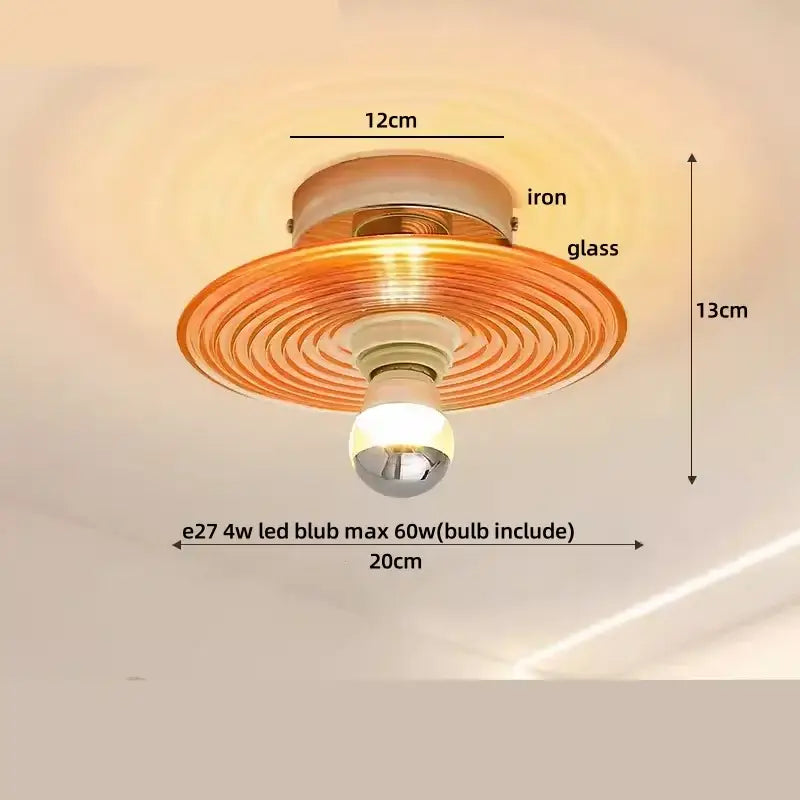 Amber warm-toned glass wood copper led ceiling light fixture with concentric ridges ideal for dining room lighting