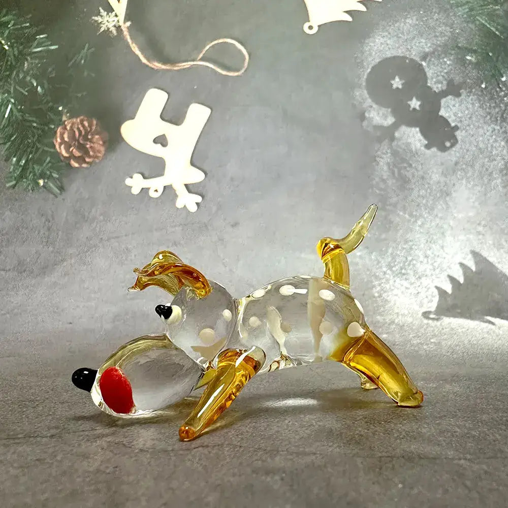 Translucent glass cartoon puppy figurine with amber legs white polka dots red nose and curled tail for bedroom decor