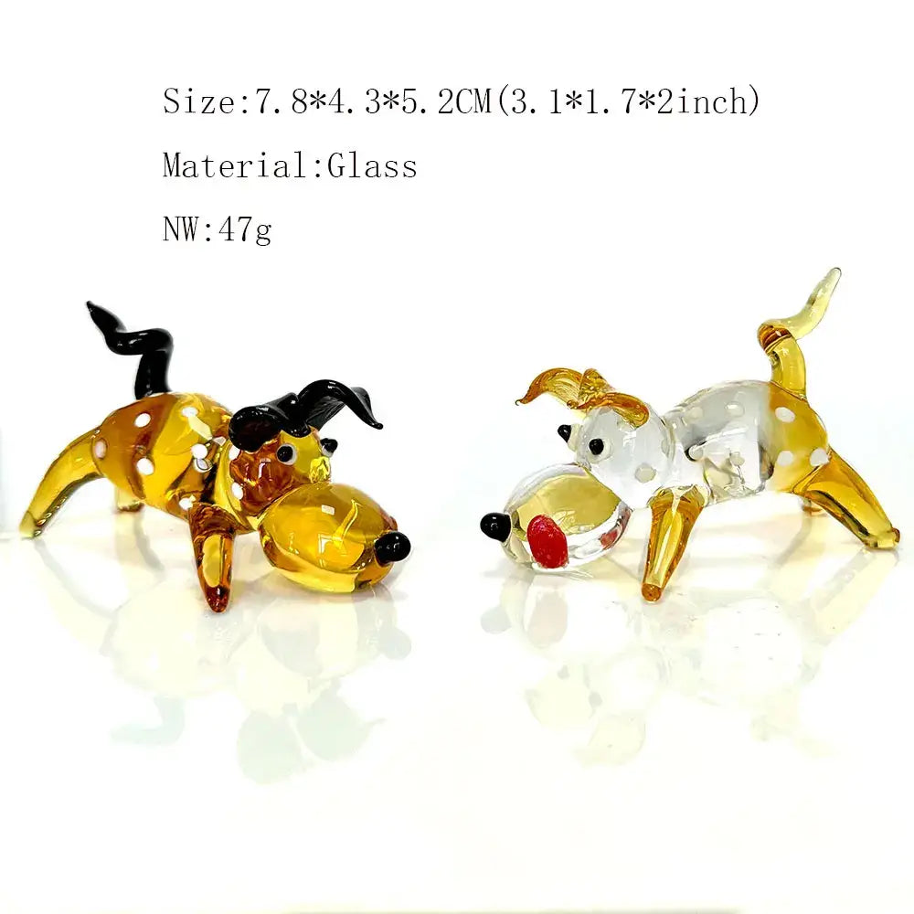 Two hand-blown crystal cartoon puppy figurines in amber black and transparent yellow for puppy figurine table decor