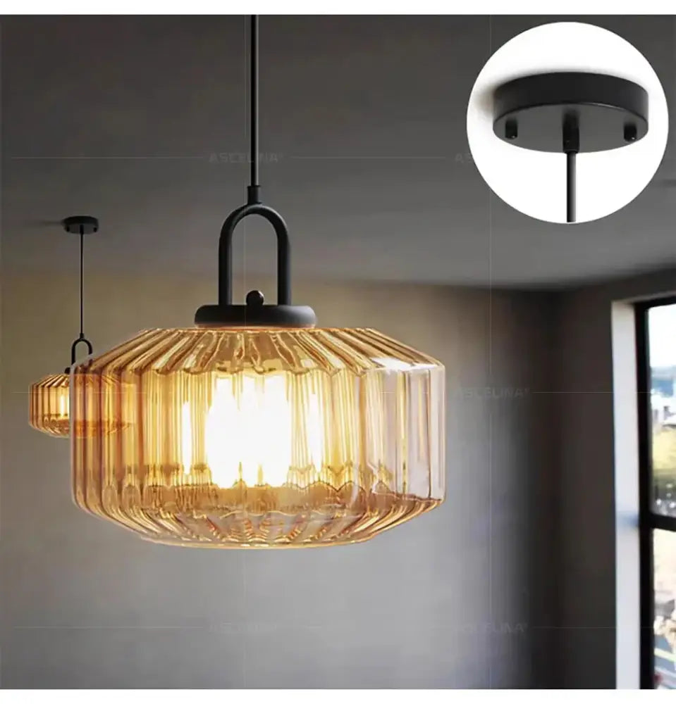 Amber-colored ribbed glass led pendant chandelier with black metal frame and chain for kitchen lighting fixture