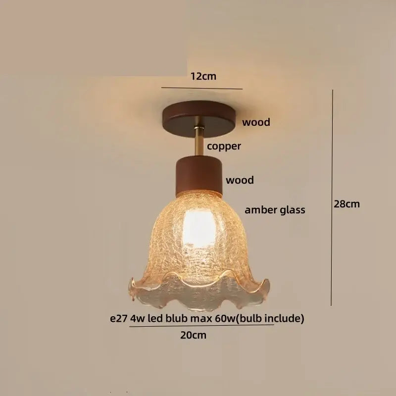 A warm amber ice crack glass ceiling light with textured ruffled design and wooden accents for bedroom decorbites amber ice