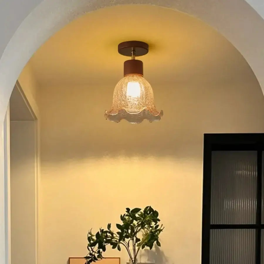 Amber ice crack glass ceiling light with warm tones, wooden base, and scalloped edge for bedroom decorbites amber ice decor