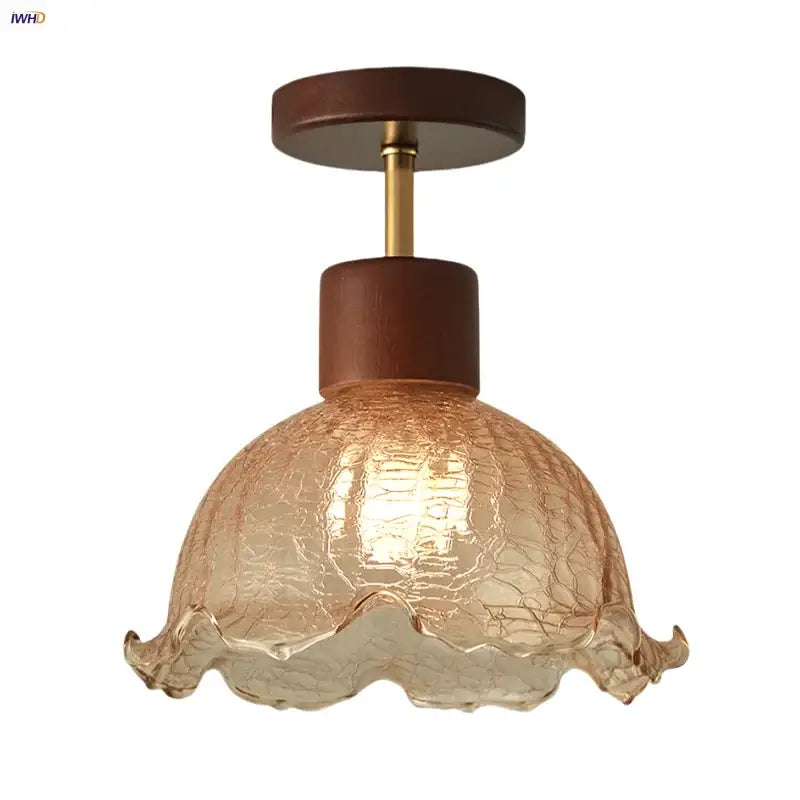 A warm-toned amber ice crack glass ceiling light with ruffled edges and dark wood accents for bedroom decorbites amber ice