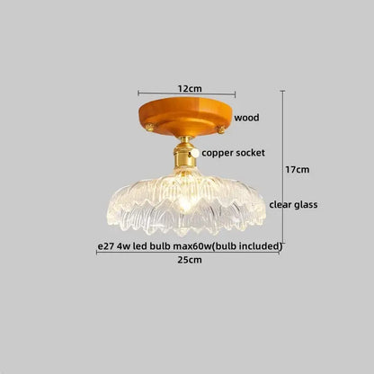 Clear glass brass glass ceiling lamp with fluted petal design and amber wooden mount by decorbites for bedroom light