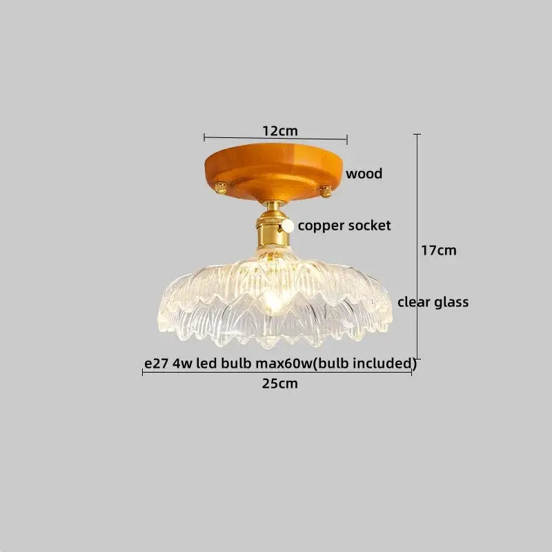 Clear glass brass glass ceiling lamp with fluted petal design and amber wooden mount by decorbites for bedroom light