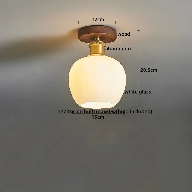 Amber leaf brass glass ceiling lamp with round white glass pendant, wooden top, and brass aluminum base for bedroom decorbites brass glass